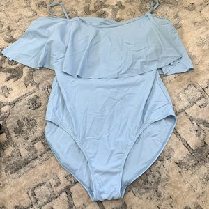 One piece, blue off shoulder swim. Only worn once for photos.